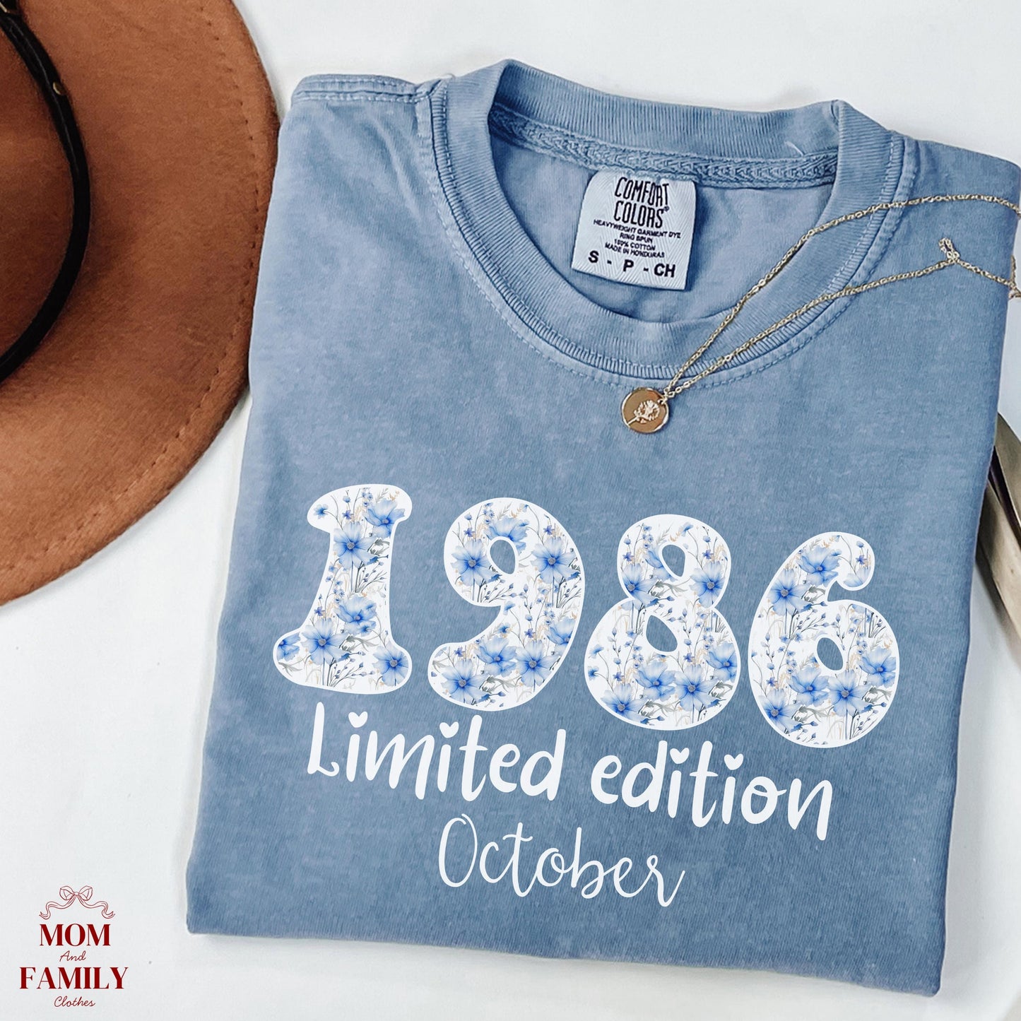 White crewneck sweatshirt featuring floral patterned 1986 numbers with special edition June text, feminine retro birthday design for a 40th milestone celebration.